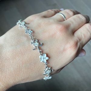 Sterling Silver bracelet with turtles and flowers